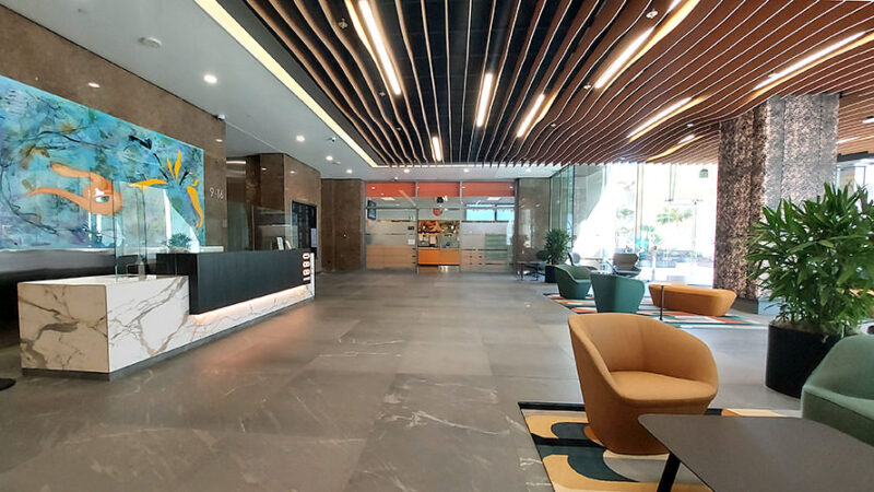 Interiors Transform Late 80’s Entry to Tenant Centerpiece | headshot